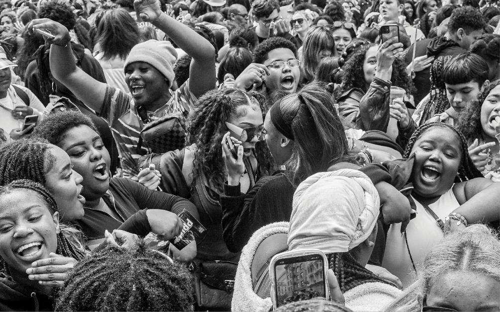 An exuberant crowd, photographed by Dan Kutler